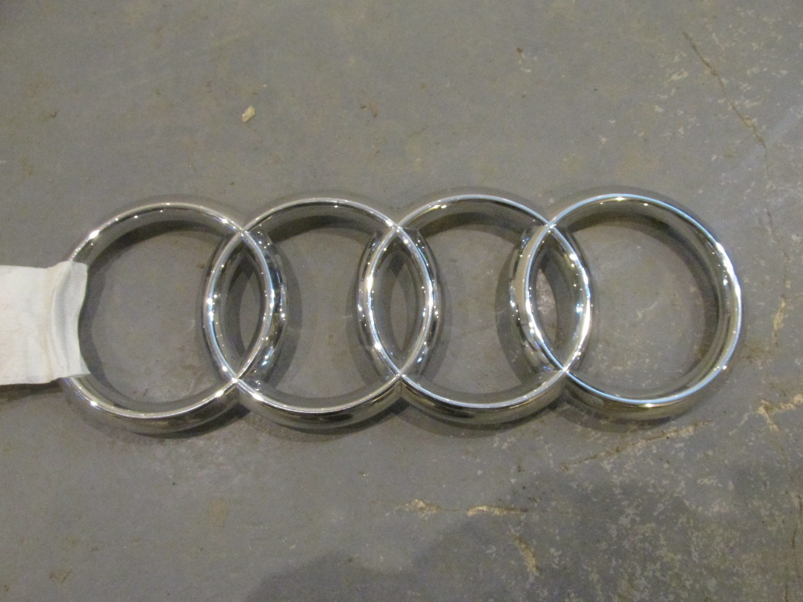 Эмблема Audi Q3 2012-2018