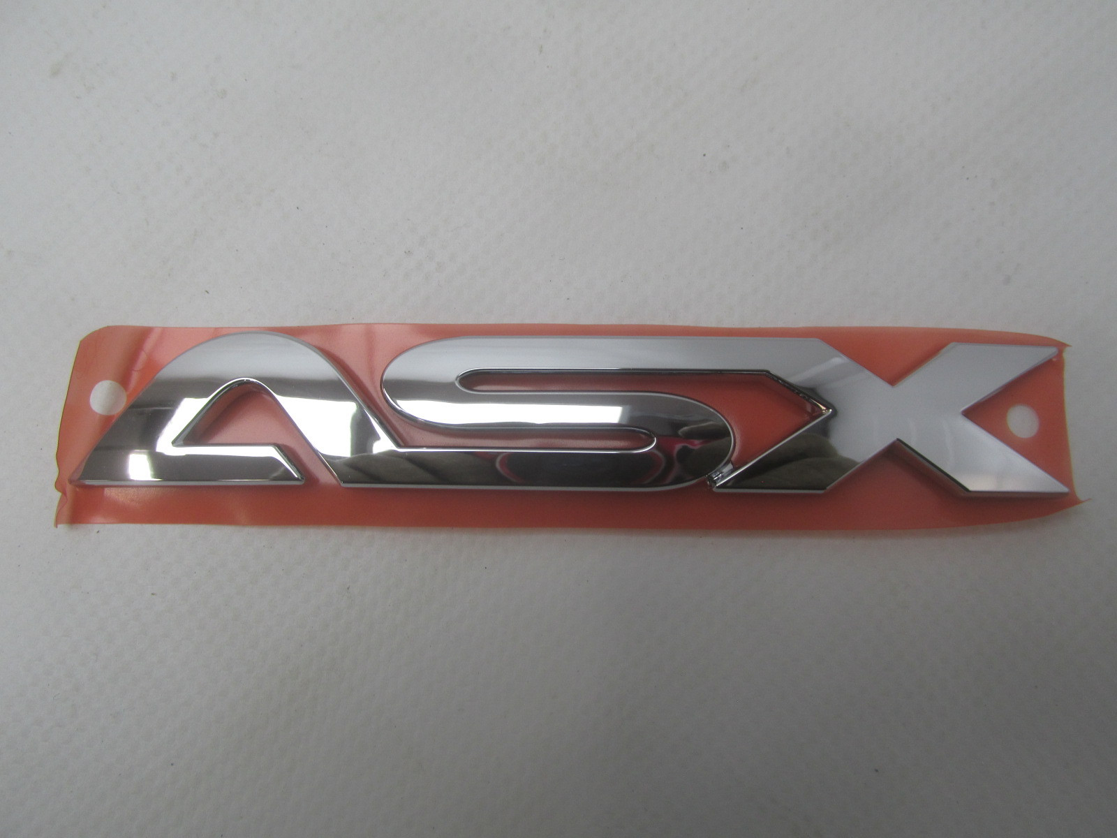 Эмблема Mitsubishi ASX 2010>